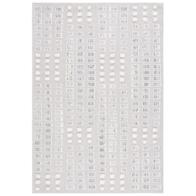 Tapis géométrique Delu fabriqué à la machine en gris / ivoire