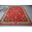 Tapis turc antique à motif floral rouge pour une décoration intérieure élégante