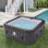 4-6 Person Inflatable Hot Tub, Portable Air Jet Outdoor Spa Heater with Built-in Heat Pump, Tub Cover, 2 Filter Cartridges, 1 Cup Holder, Black