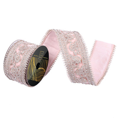 2.5" x 5yd Rose Gold Wired Ribbon with an intricate Champagne Jeweled Die Cut Overlay. Gold Metallic Backing. Measuring 2.5 inches in width and 5 yards in length, it's perfect for a variety of festive projects.