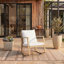 Chaise berçante d'extérieur en osier / rotin avec coussins Cummington