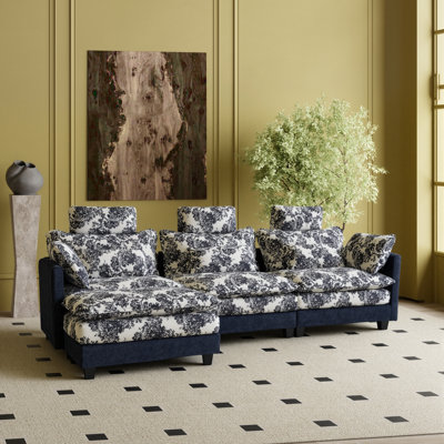 Ensemble de canapé modulaire en L bleu et noir à motif floral avec coussins