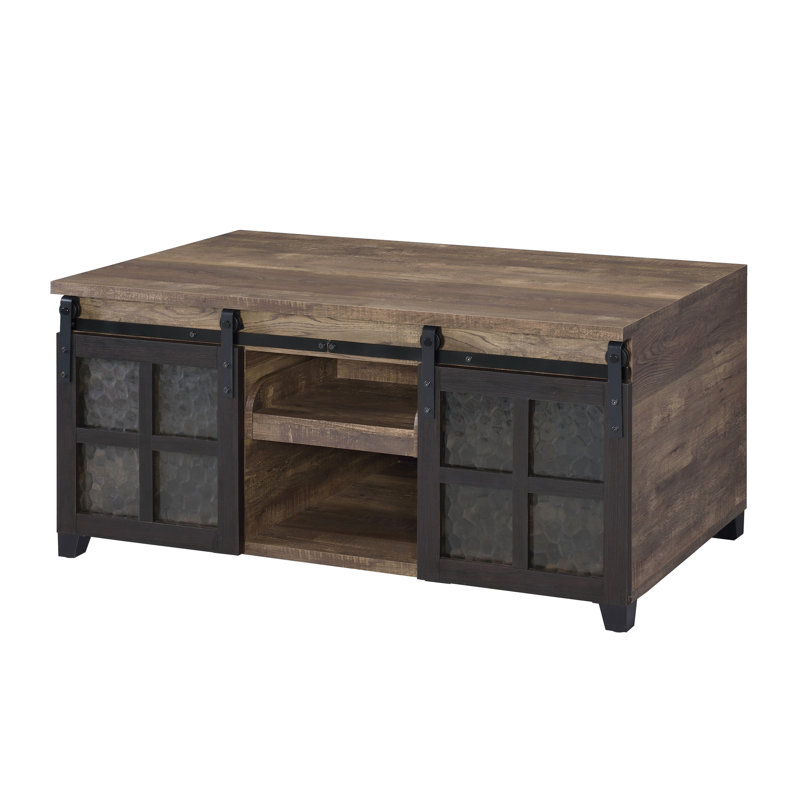 Table basse rectangulaire à finition rustique, avec portes coulissantes et rangement dissimulé, solutions