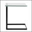 Table de bout contemporaine Zenn avec structure en métal et plateau en verre transparent, parfaite pour les intérieurs modernes et minimalistes.