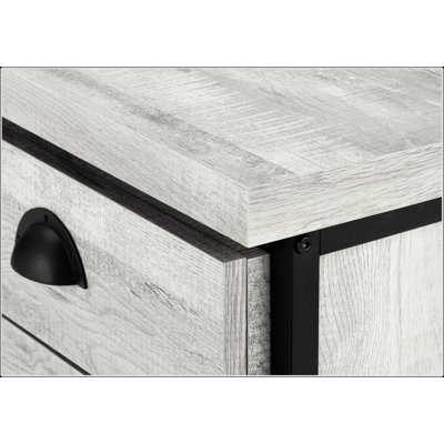 Bureau d'ordinateur moderne en stratifié gris avec tiroirs de rangement, parfait pour le bureau à domicile et les petits espaces