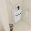 Meuble-lavabo moderne 16 po avec lavabo en céramique. Pour les petites salles de bain. Porte à fermeture en douceur. Blanc. Espace de rangement généreux avec lavabo et salle de bain de 16 po. Aspect. Abondante