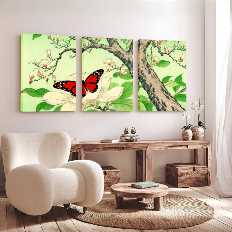 Ensemble de 3 tableaux sur toile tendue représentant des papillons et des fleurs de magnolia, H 18 po x l 36 po