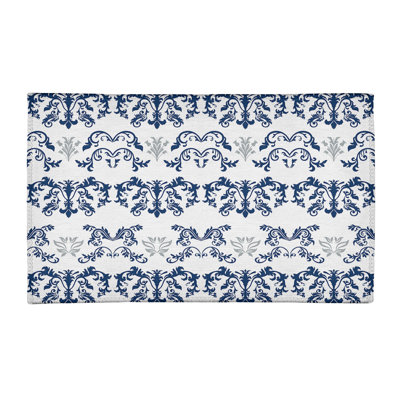 Tapis damassé blanc / bleu marine