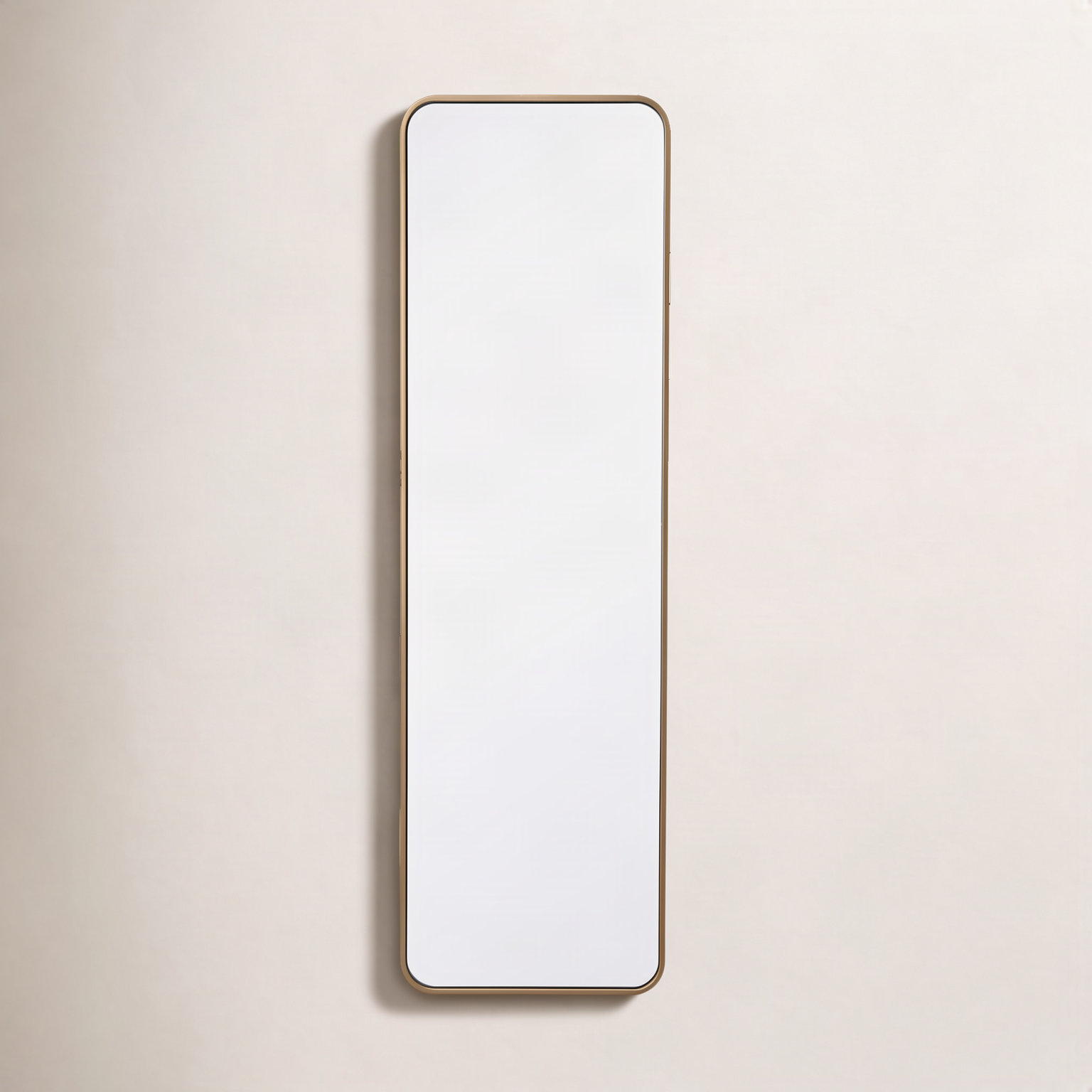 Sabine Metal Rounded Rectangle Wall Mirror, 60" x 18", Brass