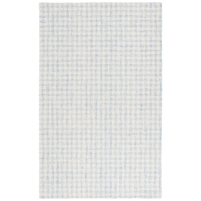 Tapis bleu / ivoire en laine et coton touffeté à la main Antine