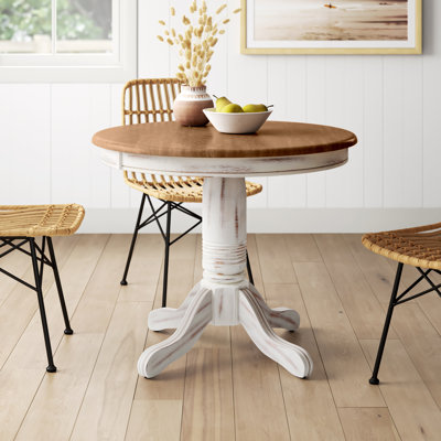 Wilkey Round Solid Wood Dining Table