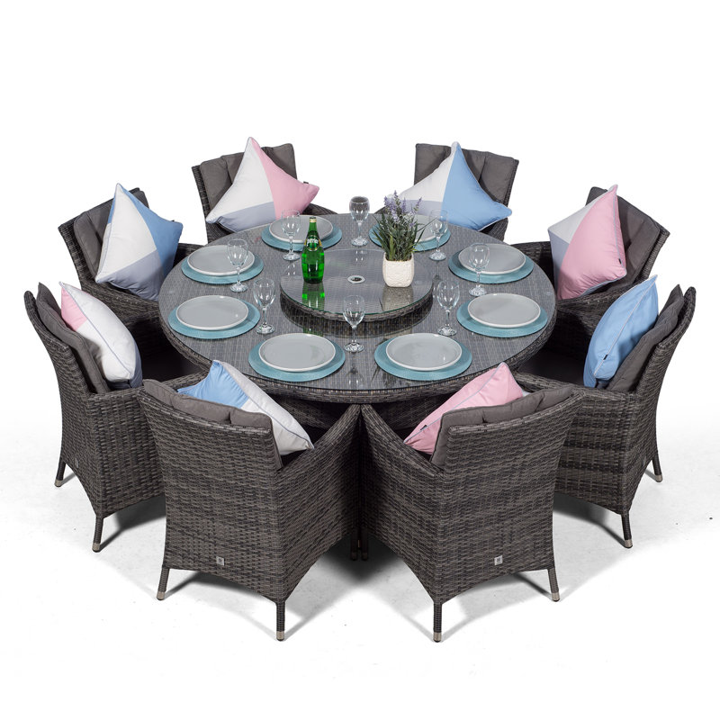 Karas 4 - Person Wicker Patio Dining Set with Square Table , Cushions Included