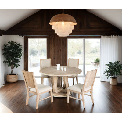 Behadil Round Dining Table Set