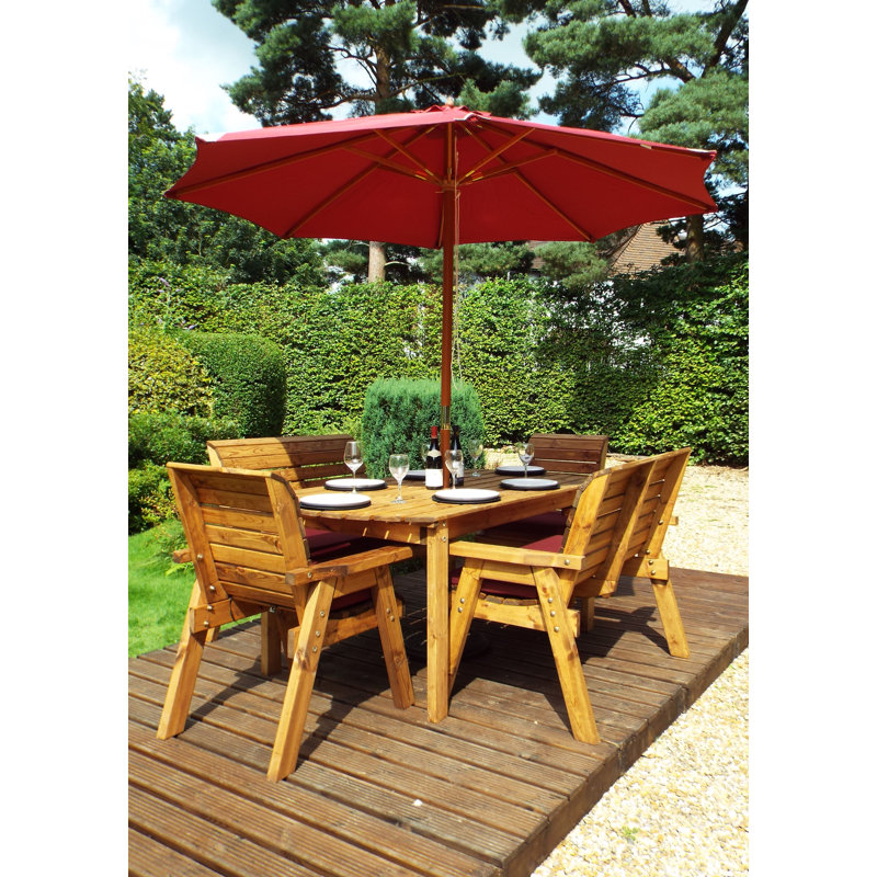 Faulk 6 - Person Wood Patio Dining Set with Rectangular Table , Cushions Included, Burgundy