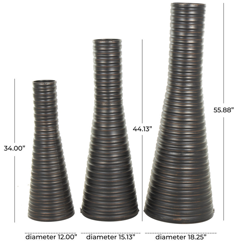Ensemble de grands vases en bronze à rainures horizontales Colpitt