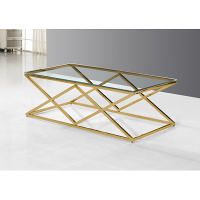 Table basse avec plateau en verre et base en acier inoxydable poli doré