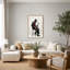 Tableau sur toile représentant un saxophoniste assis sur un tabouret en gilet rouge-554106032