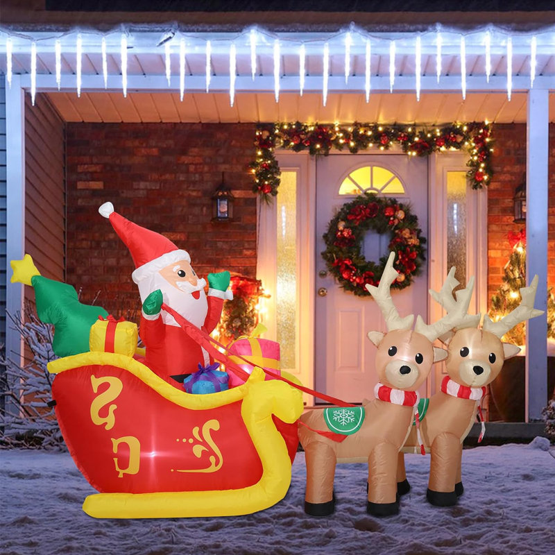 The Holiday Aisle® Santa Claus on Sleigh with Two Reindeer Inflatable ...