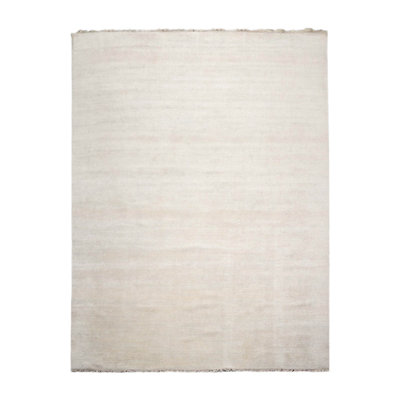 Tapis beige noué à la main