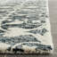 Tapis floral en laine touffeté à la main Dashanna-15994540