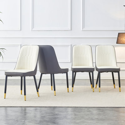 Modern Dining Chair With Dual Tone PU Leather And Metal Legs, Versatile For Multiple Spaces