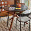 Table de salle à manger noire en pierre frittée