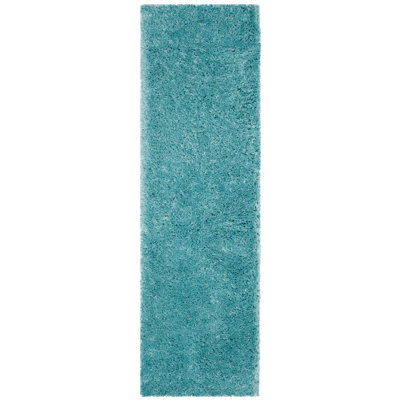 Hermina Light Turquoise Area Rug