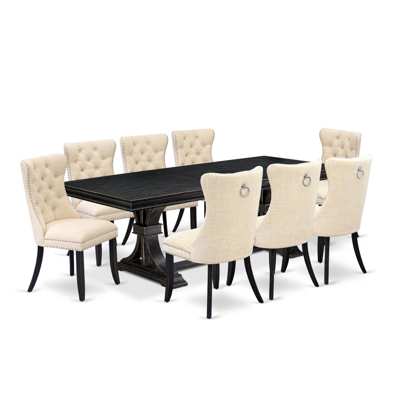 Cet ensemble de salle à manger moderne 9 pièces se compose d'une table rectangulaire et de 8 chaises rembourrées en tissu de polyester beige clair avec dossier capitonné à boutons - finition noire sablée.
