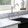 Whitehaus Collection Bridge Faucet with Long Traditional Swivel Spout, Lever Handles and Solid Side Spray