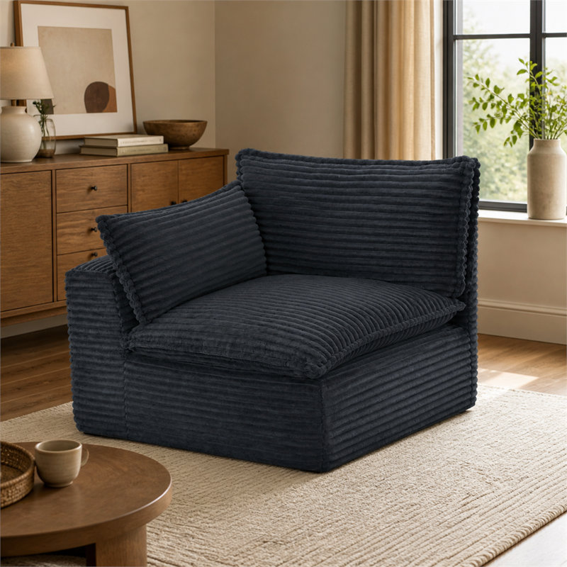 Canapé modulaire composé de mousse grise segmentée et emballé sous vide ; comprend un accoudoir droit permettant une configuration flexible — un fauteuil minimaliste, durable et décontracté, idéal pour le salon.