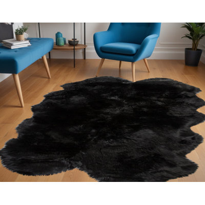 Tapis noir à imprimé animal
