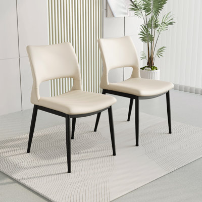 Ensemble de 2 chaises de salle à manger modernes et minimalistes en similicuir blanc, dossier confortable, pieds en métal, convenant aux restaurants, cuisines et bureaux.