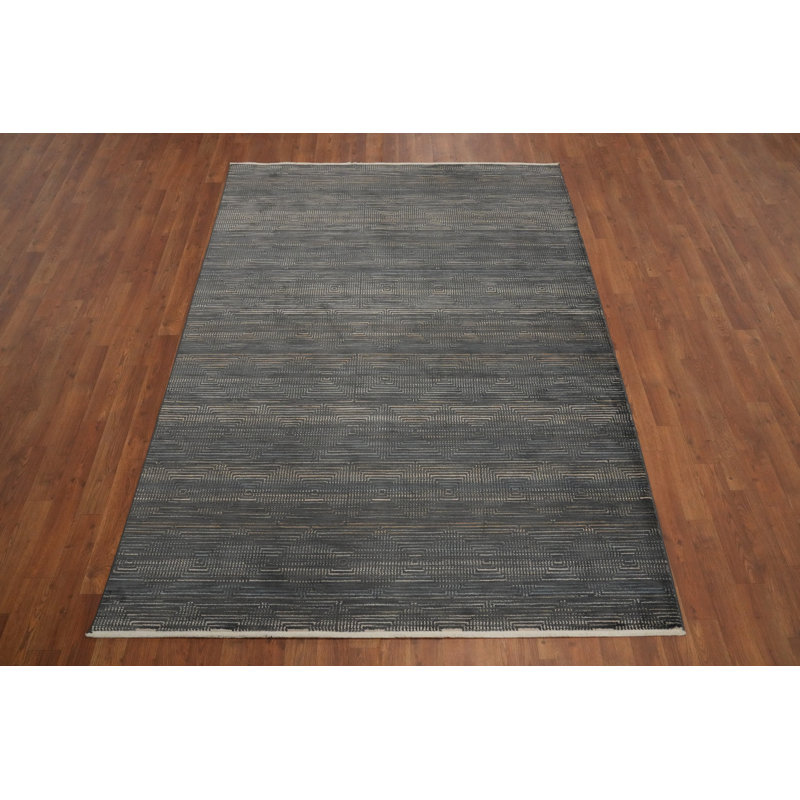 Élégant tapis gris foncé 5 x 7 pour une touche moderne