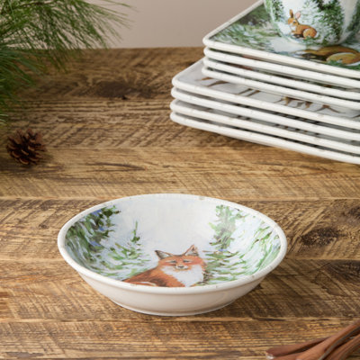 Winter Cabin Set of 4 Soup Bowls — Wide, generous 38-ounce ceramic bowls illustrated with a winter woodland scene, made for every warming soup and stew of the cabin season.