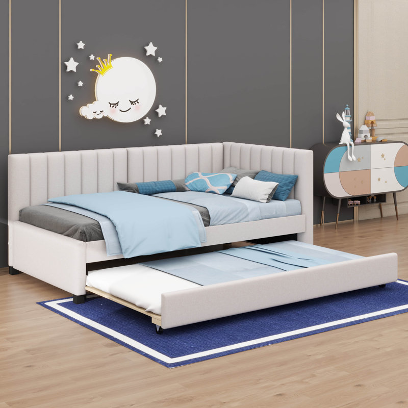 A Upholstered Daybed That Comes With A Built-In Twin-Sized Pull-Out Sofa Bed Frame, Beige