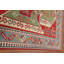 Tapis vert et rouge Kazak