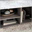 Table basse relevable avec rangement dissimulé et hauteur réglable pour un salon polyvalent
