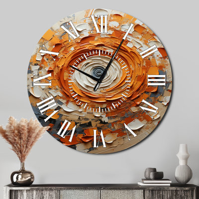 Horloge murale orange et blanche