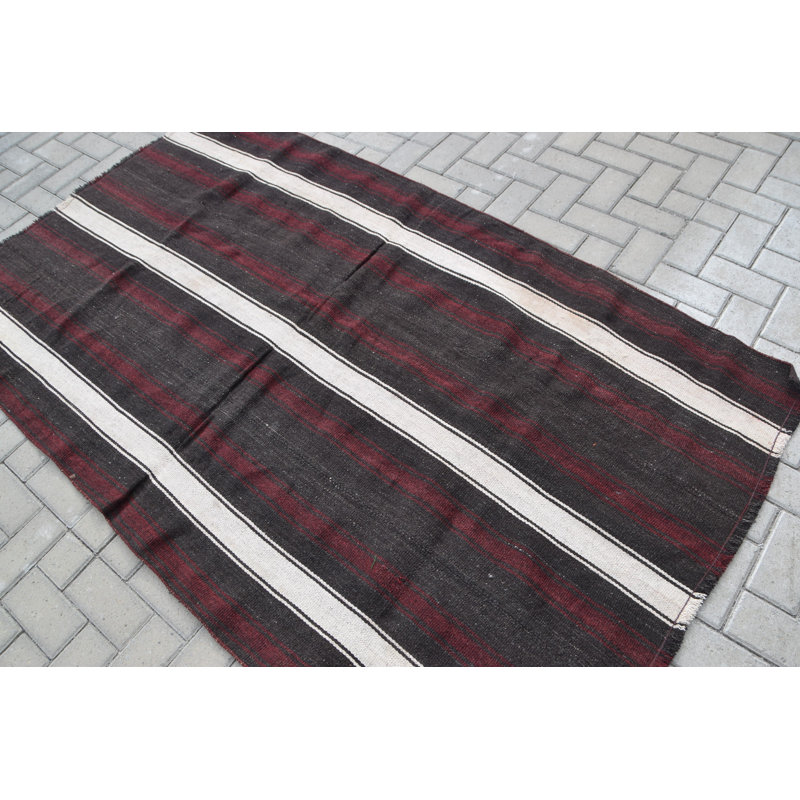 Tapis turc vintage en laine tissé à la main dans de riches rayures noires pour un décor unique