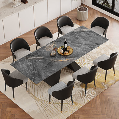 Ensemble de table de salle à manger extensible 94,5 po avec plateau en pierre frittée rectangulaire et 8 chaises en similicuir