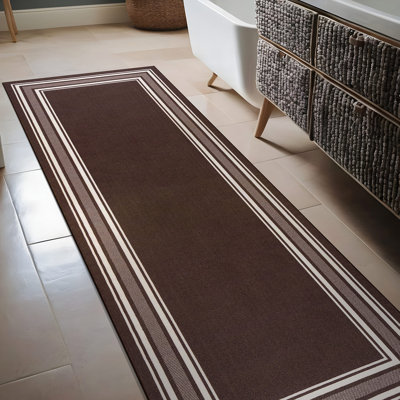 Tapis brun Quiogue