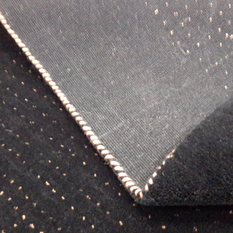 Luro Geometric Area Rug in Black