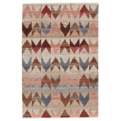 Tapis rose à chevrons Sanaa