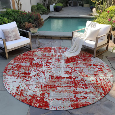 Tapis intérieur / extérieur rouge Caelan 