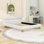 Grand lit plateforme tapissier Teddy, design minimaliste courbé