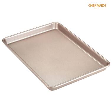 https://assets.wfcdn.com/im/77415091/resize-h380-w380%5Ecompr-r70/1434/143403128/CHEFMADE+13-Inch+Rimmed+Baking+Pan%2C+Non-Stick+Carbon+Steel+Cookie+Sheet+Pan+For+Oven+Roasting+Meat+Bread+Jelly+Roll+Battenberg+Pizzas+Pastries+9.7%22+X+13.6%22+X+1%22+%28Champagne+Gold%29.jpg