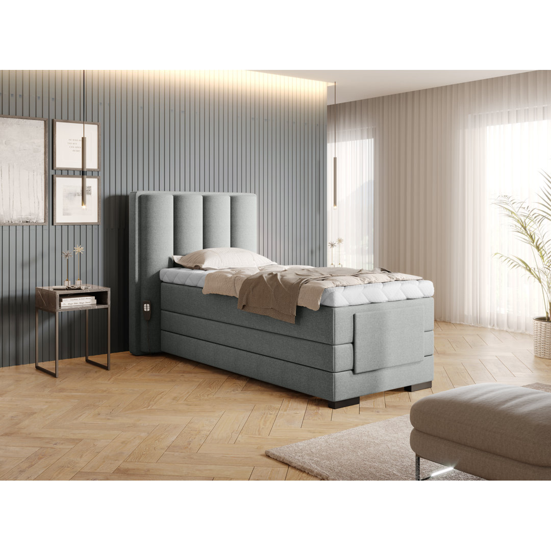 Elektrisch verstellbares Boxspringbett Gramer mit Topper