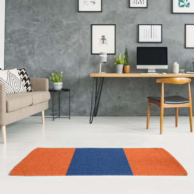 Tapis orange / bleu tissé à plat New York