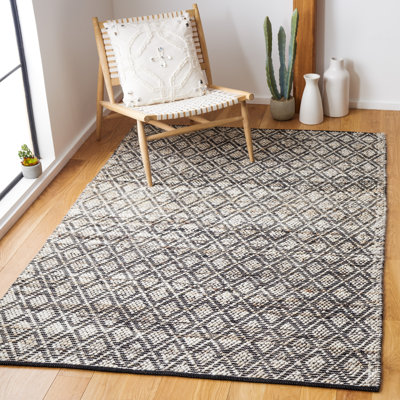 Tapis en laine / coton tissé à la main Natura en noir / ivoire