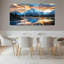 Ensemble de 3 tableaux sur toile représentant un coucher de soleil sur un paysage de montagne-618835182